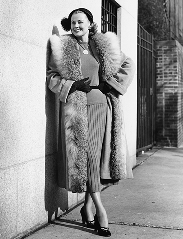 Women from the 1950s in fur coat on the street